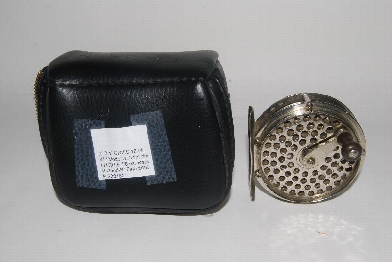 Image for 2 3/4" ORVIS 1874  4th Model  with Protective Front Rim. 5 7/8 oz. Screwed Nickel-plated Brass ; Detachable crank handle with black knob; Marked on back plate: "C.F. Orvis  /.Maker / Patented. / Manchester VT." .